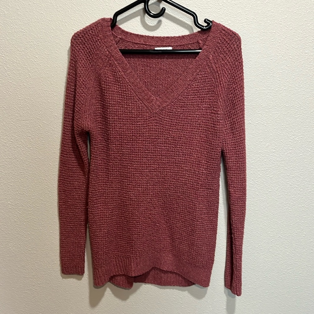Maurices size XS sweater in a blush rose color that is longer cut.